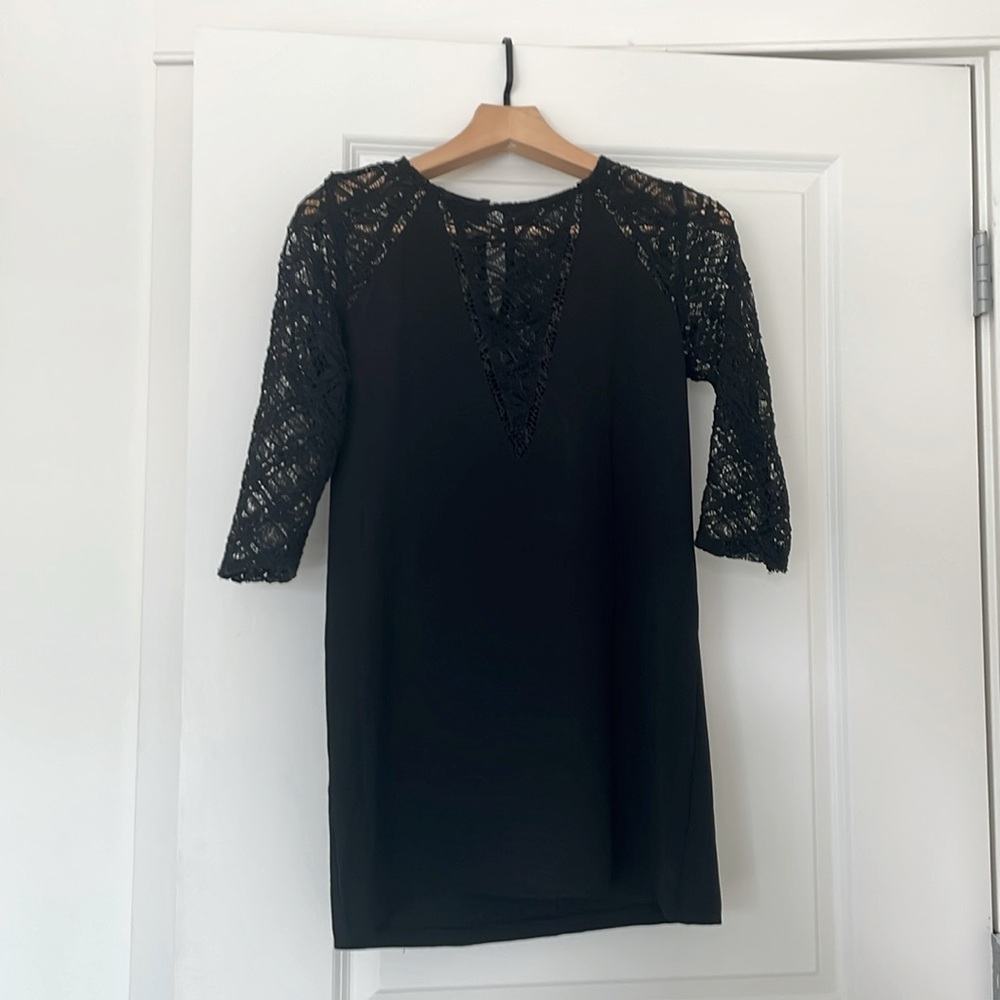 Cute black short dress with lovely details